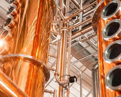 Copper Column Stills inside Bently Heritage Distillery